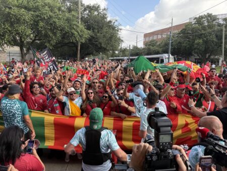 Thousands of Portugal, Uzbekistan fans march to match in Houston, where Ronaldo makes World Cup history